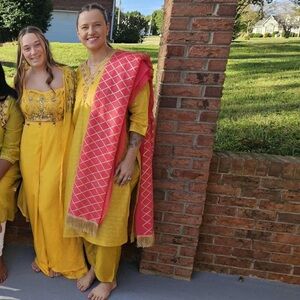Yellow Embroidered Salwar Kameez with Pink Dupatta